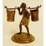 A 19th Century parcel gilt bronze figure of a Moor water carrier,