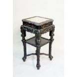 A Chinese hardwood two tier jardiniere stand,