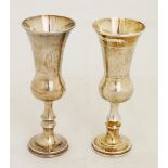 A pair of  Edward VII Kiddush Goblets, thistle shaped on circular feet, wriggle work engraved.,