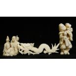 A Japanese carved ivory netsuke of a standing figure with monkey on his shoulders, 5.