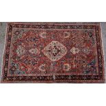 A central Persian rug the coral field with central medallion,