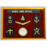 HMS Arc Royal and HMS Hood - two framed collections of  badges relating to the aforementioned ships,