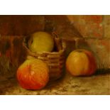 English School, early 20th Century - still life of apples  and pears in a basket before a wall,