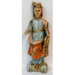 A 17th Century polychrome decorated figure of a young female with crown, carved hair,