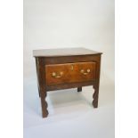 A small oak dresser base the oversailing top above one short drawer with ovolo mouldings,