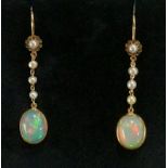 A pair of opal and seed pearl pendant earrings,