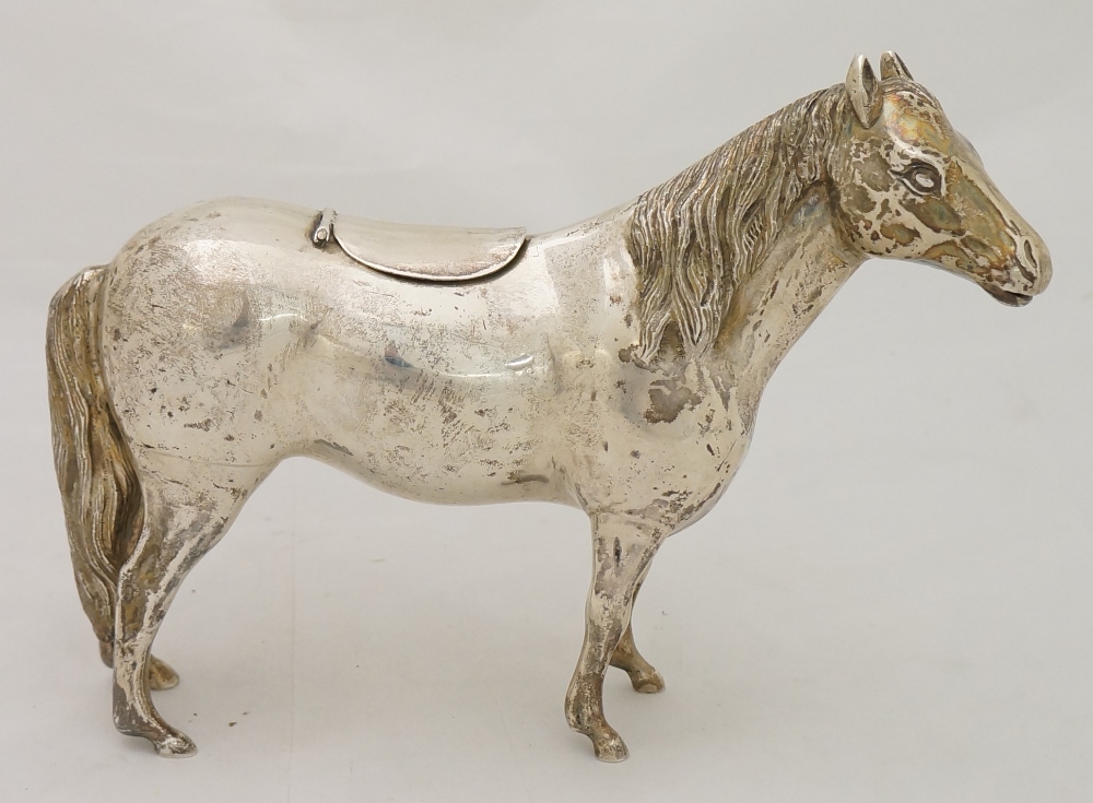 A late 19th Century Continental ashtray ? cast in the form of a horse, its back with hinged cover, . - Image 2 of 4