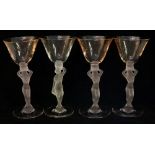 A harlequin set of four Art Deco Czechoslovakian cocktail glasses, flared bowls,