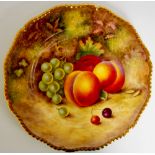 A Royal Worcester shaped circular plate with gadrooned rim still life painted with peaches,