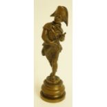 A 19th Century bronze figure of a young soldier holding a gun, a satchel on his hip,