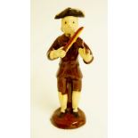 An Astbury-Whieldon type figure of a violin player wearing tricorn hat, brown coat and breeches,