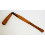 A 19th Century turned truncheon with "flail" terminal, iron fittings, turned handle and end,