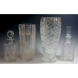 Two large cut glass vases, 36cm x 30cm high; two cut glass decanters,