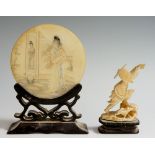 A Chinese alabaster disc engraved and decorated with female in an interior, 8cm diameter,