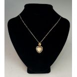 An 18th Century rock crystal heart shaped pendant,