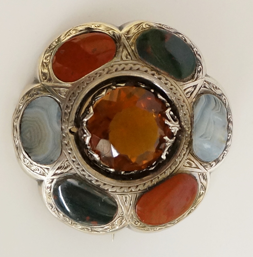 A Scottish hardstone brooch of flower head design with central yellow stone facet cut within an - Image 2 of 2