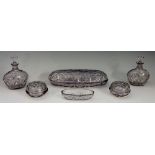 Orrefors - a cut glass dressing table set consisting of oval covered dish, two covered jars,