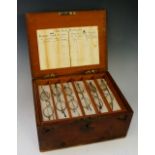 A 19th Century box containing spectacles with concave and convex trial lenses,