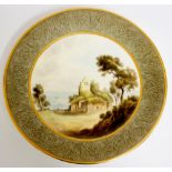 A Royal Worcester cabinet plate painted to the centre with a view of Sudbrook Chapel,