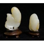 A pale celadon jadeite carving of a melon and leaf, 6cm long,