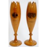 A pair of Mauchline ware tulip shaped vases with circular pedestal bases,