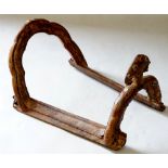 A saddle tree, the wooden base with shaped and joined iron panels for strength,