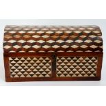 An unusual dome topped cube parquetry inlaid box the front and sides with panels of triangles the