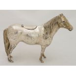 A late 19th Century Continental ashtray ? cast in the form of a horse, its back with hinged cover, .