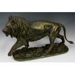 Christophe Fratin, French 1808-1864 - Green patinated bronze figure of a prowling lion,