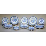 A Worcester blue and white willow pattern dinner service comprising five 27cm dinner plates,