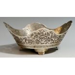 A Continental silver bonbon dish, the pierced side engraved with a floral design, Greek key border,