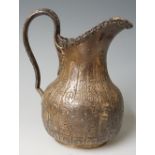 A Victorian milk jug the fluted body engraved overall with pair of  vacant cartouches within