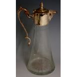 A silver plated claret jug, the hinged cover with leaf wrapped acorn finial,