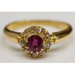 An 18ct yellow gold, ruby and diamond ring,