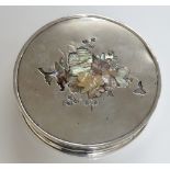 A George V silver circular shallow box the lid Shibayama decorated in mother of pearl and abalone