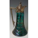 A silver plated claret jug with anthemion cast spout the collar engraved,