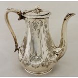 A Victorian panelled pear shaped coffee pot the hinged cover with fruit and leaf finial,