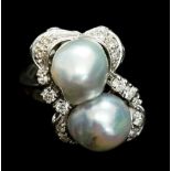 A white gold, iridescent grey pearl and diamond set ring,