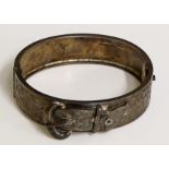A Victorian silver bracelet of foliate engraved belt and buckle form, 6.