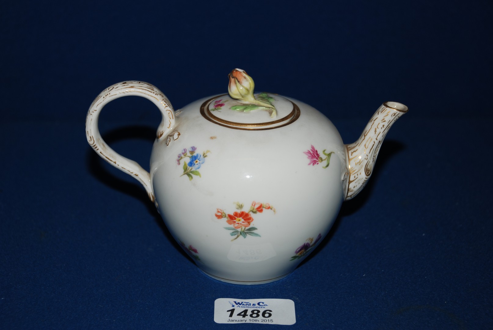 A Meissen Teapot with floral and gilt pa