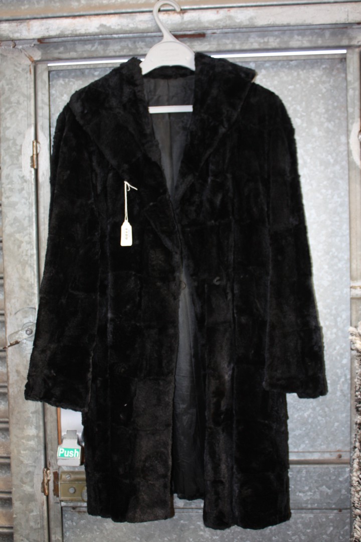 A ladies mole skin fur coat