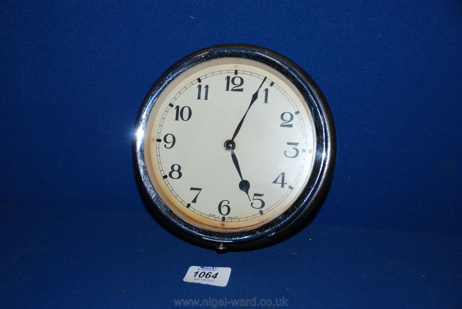 A round chrome framed bezel 1940's/50's Coach Clock.