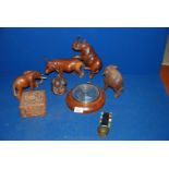 Four wooden animal carvings including Indian water Buffalo, African and Indian elephants,