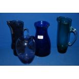 Three coloured Lemonade Jugs and purple Vase