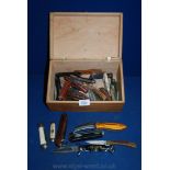 A box containing thirty one Penknives including Fish knife, The Hunter, Marksman, etc.