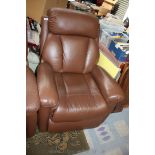 A modern brown leather upholstered Armchair with electrically reclining back