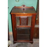 A good Victorian Mahogany Music Cabinet, upstand back, rectangular top with moulded edge, the