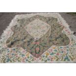 A large embroidered Wool Rug, 110'' x 130'' approx.