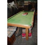 A modern light Mahogany framed Snooker Table, green baize fitted on slate top,