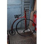 A 1950's child's Penny Farthing with Dunlop seat